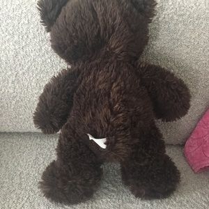 Brown soft small to medium size teddy bear